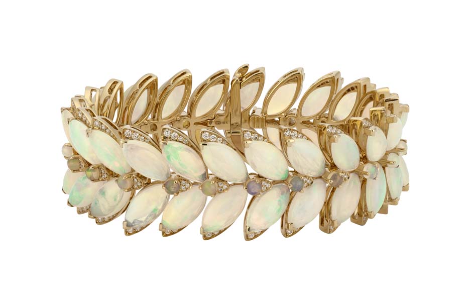 Opals_April stone of month_Stephen Webster_Magniphe Feathers bracelet set in 18ct yellow gold opal and white diamonds.jpg