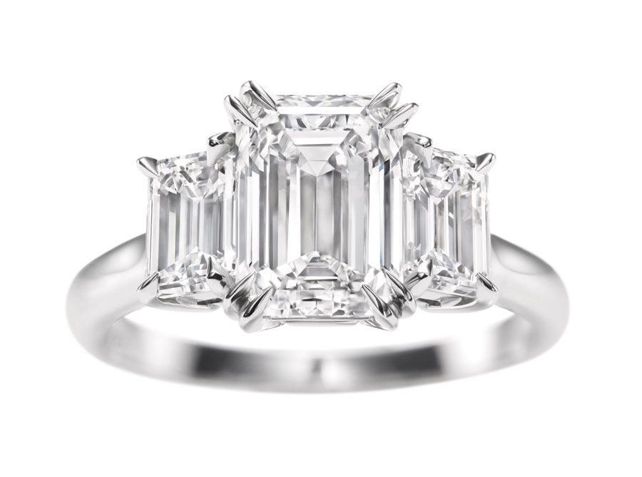 Three stone engagement rings_Harry Winston emerald cut diamond ring.jpg