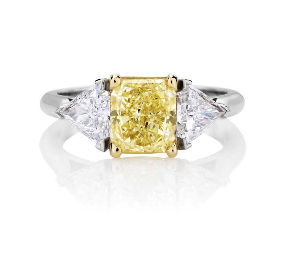 Three stone engagement rings_De Beers S Shank ring.jpg